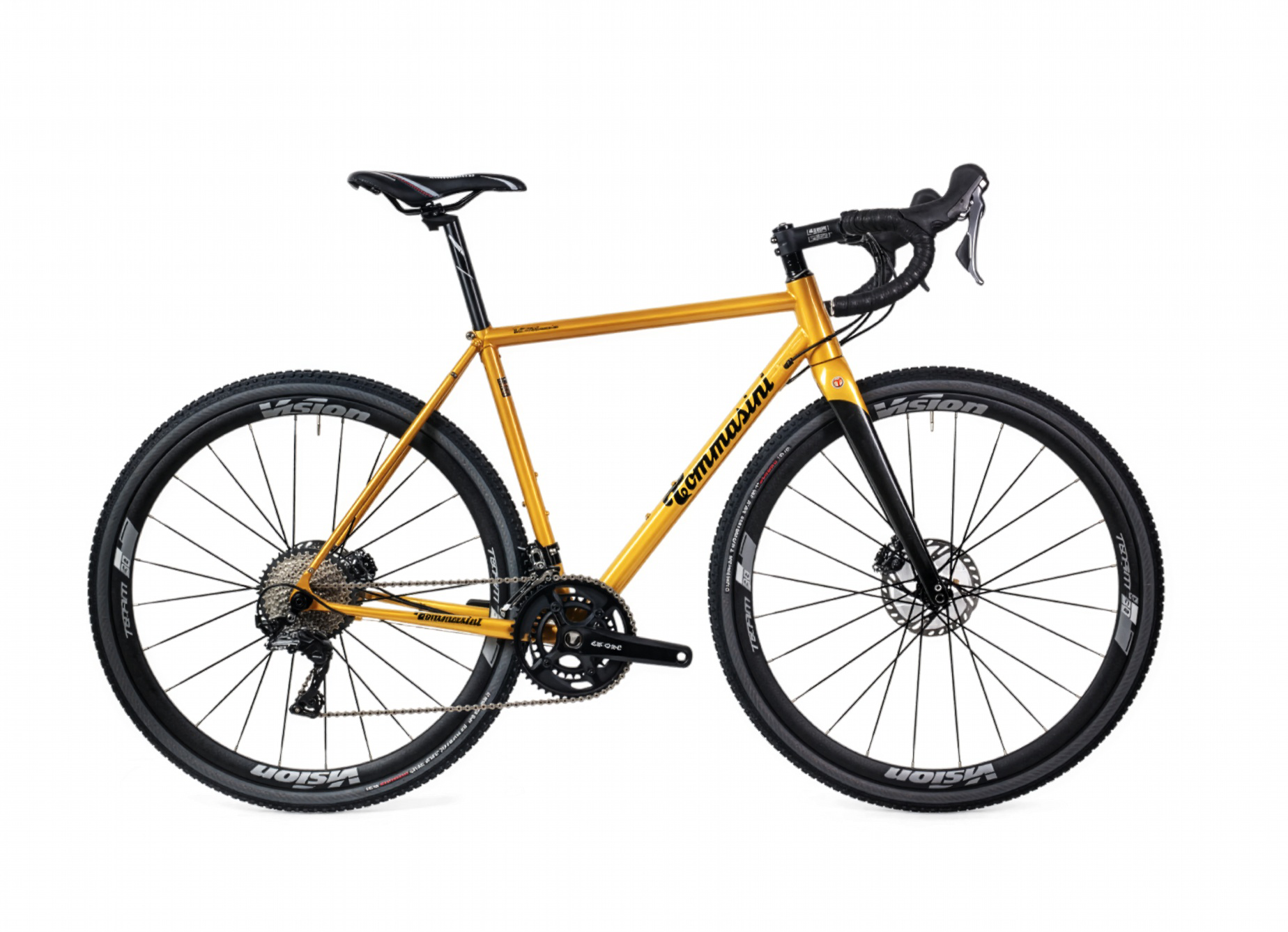 Tommasini Fire steel gravel bicycle in warm ochre finish, studio profile shot