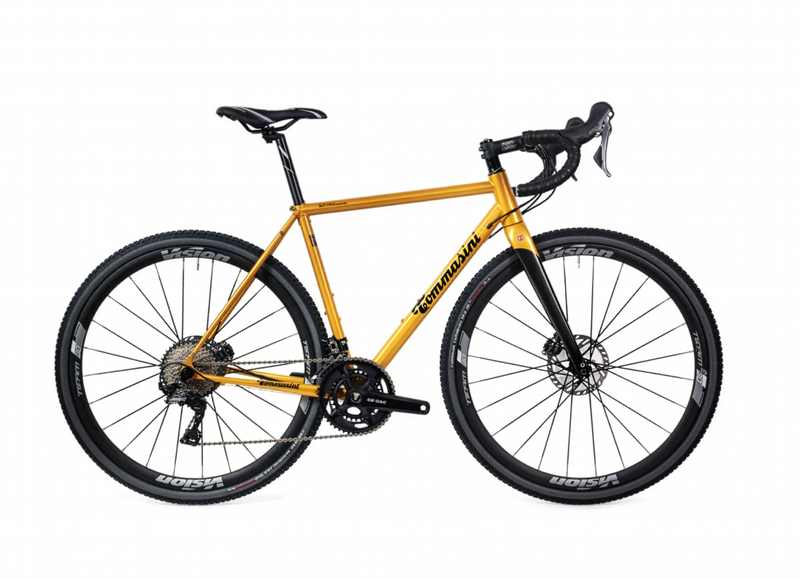 Tommasini Fire collection steel gravel bicycle in warm ochre finish, studio shot