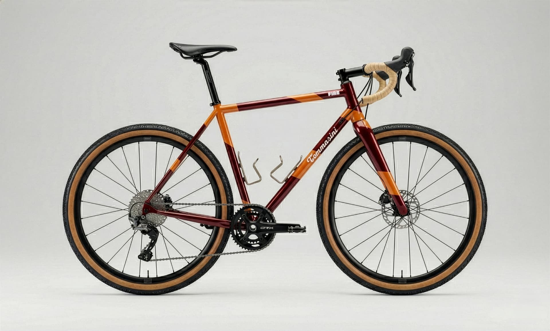 Tommasini Fire Rugged Special Edition gravel bike in deep red and ochre finish, studio shot